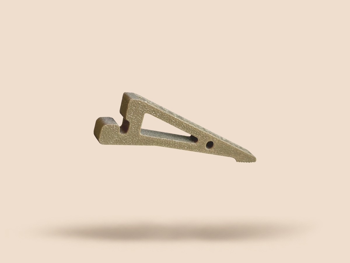 A single TALON leg showing its triangular truss frame, serrated foot and magnetic clip end